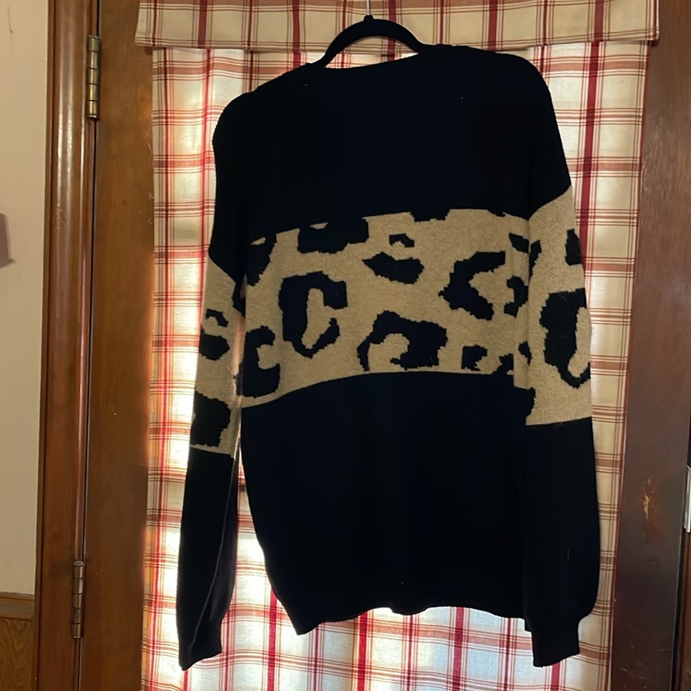 HEIMISH USA Black Crew Neck Sweater with Animal Print Design